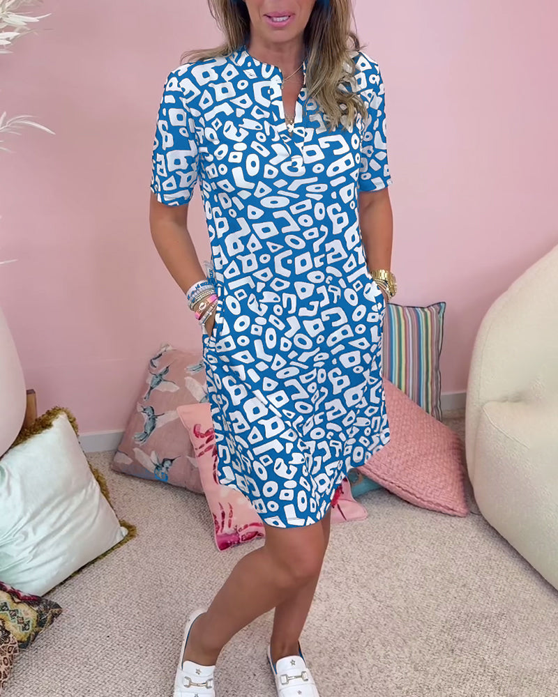 De Paris™ |  Robe décontractée à col en V et poche imprimée