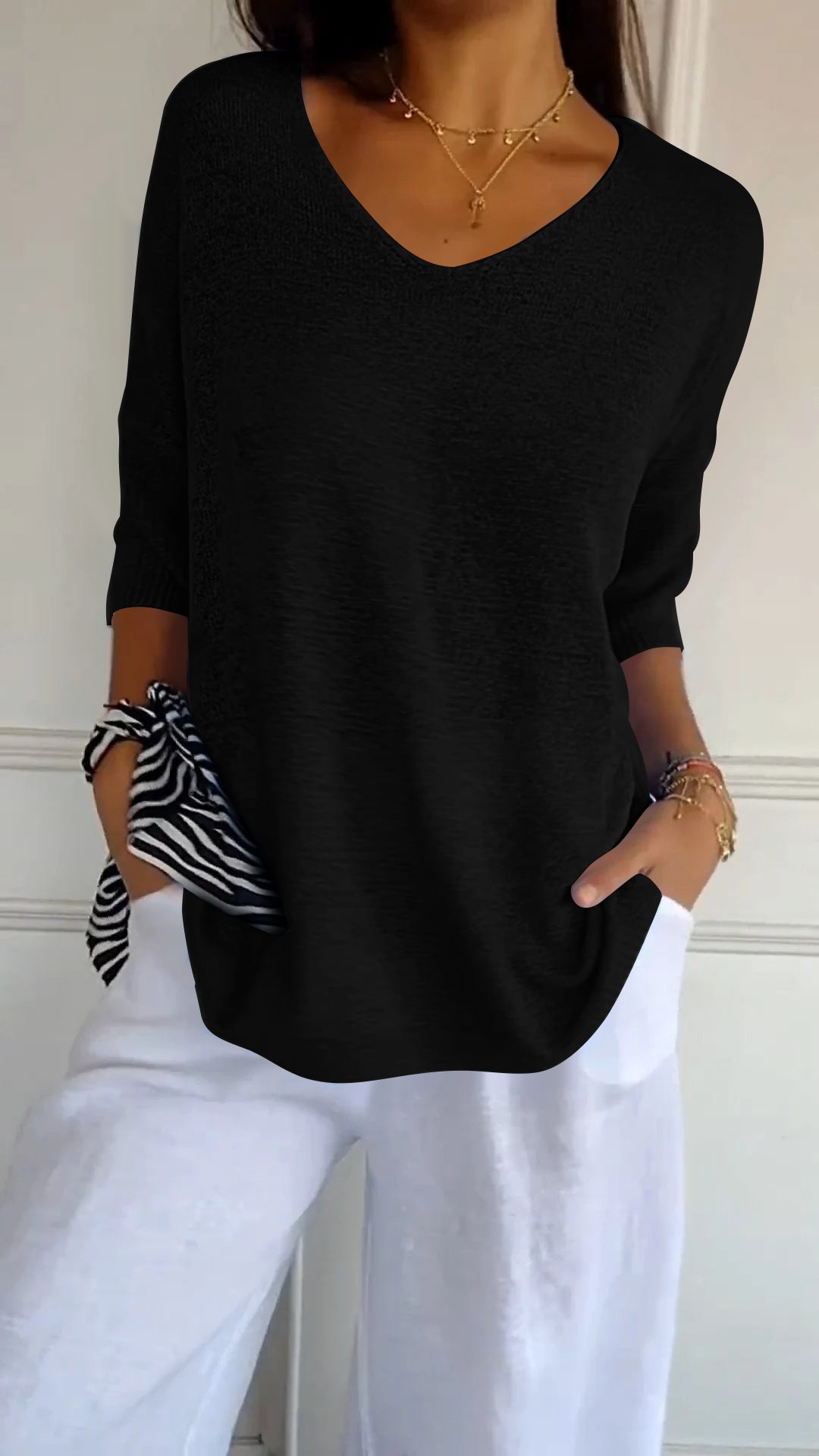 De Paris™  | Top en maille à col en V