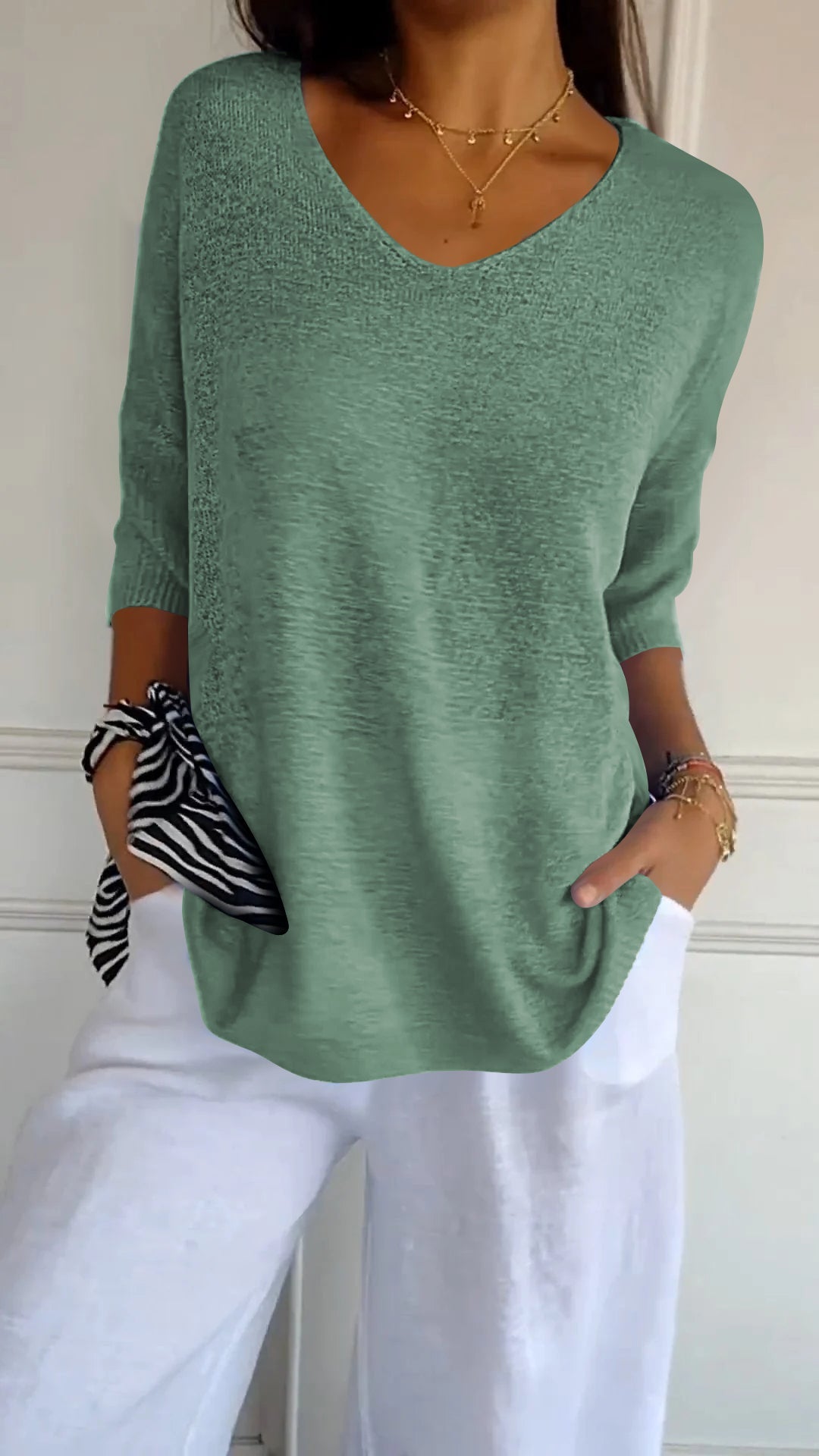 De Paris™  | Top en maille à col en V