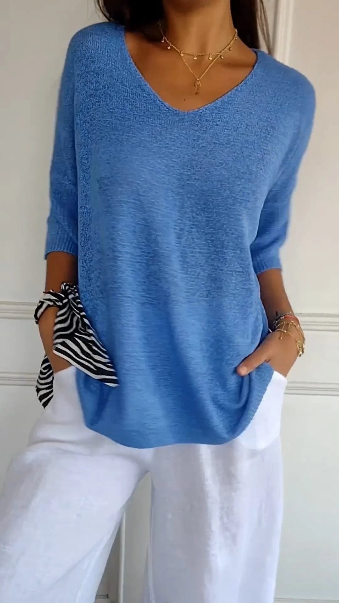 De Paris™  | Top en maille à col en V