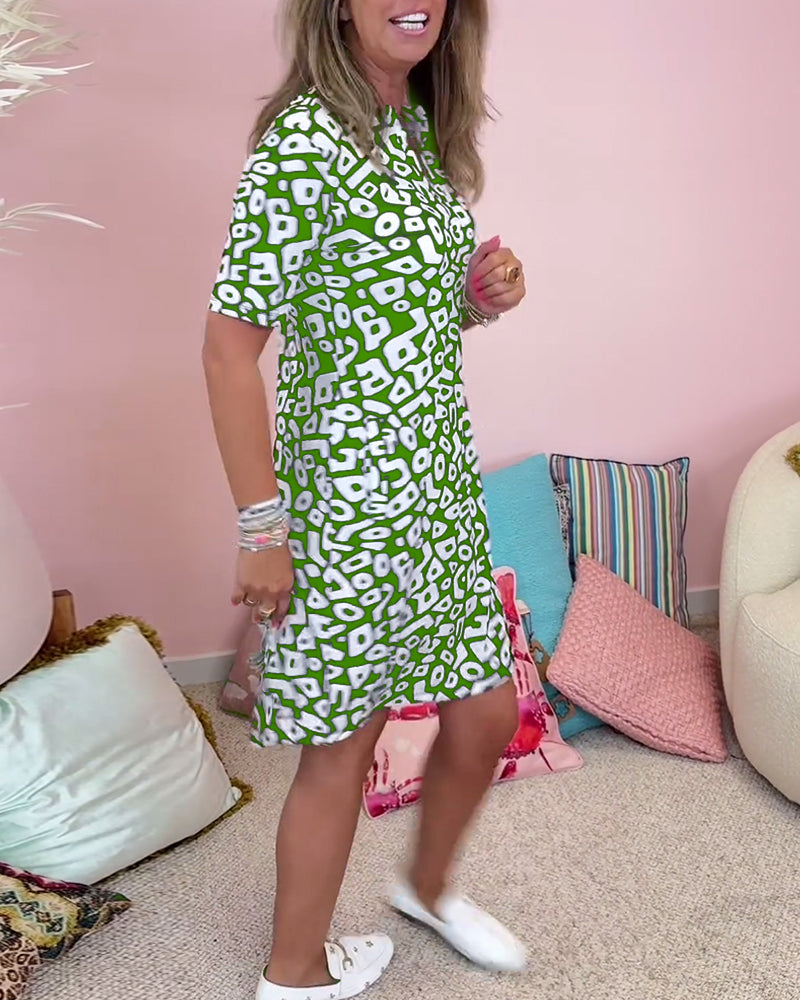 De Paris™ |  Robe décontractée à col en V et poche imprimée