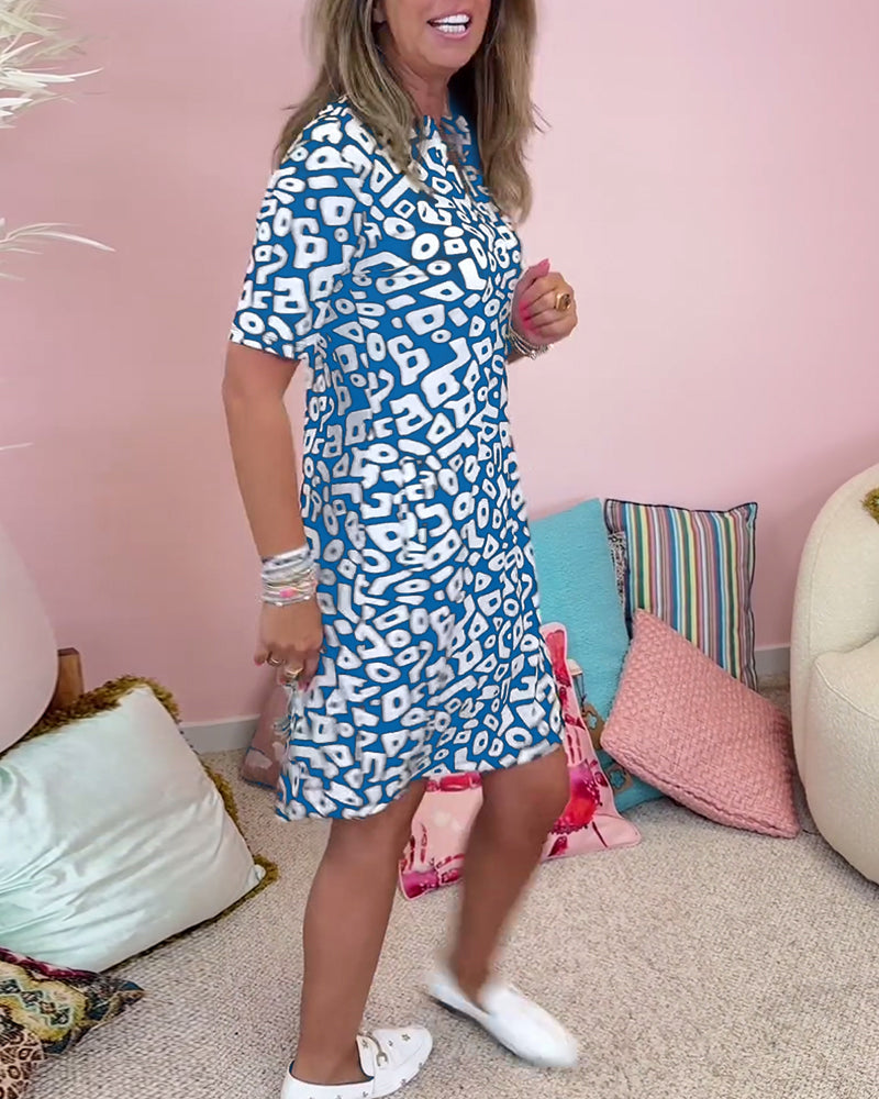 De Paris™ |  Robe décontractée à col en V et poche imprimée