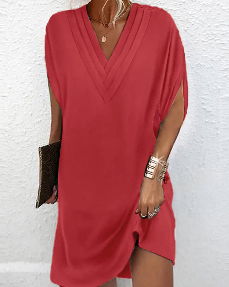De Paris™ | Robe élégante à manches fendues de couleur unie