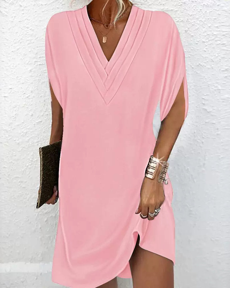 De Paris™ | Robe élégante à manches fendues de couleur unie